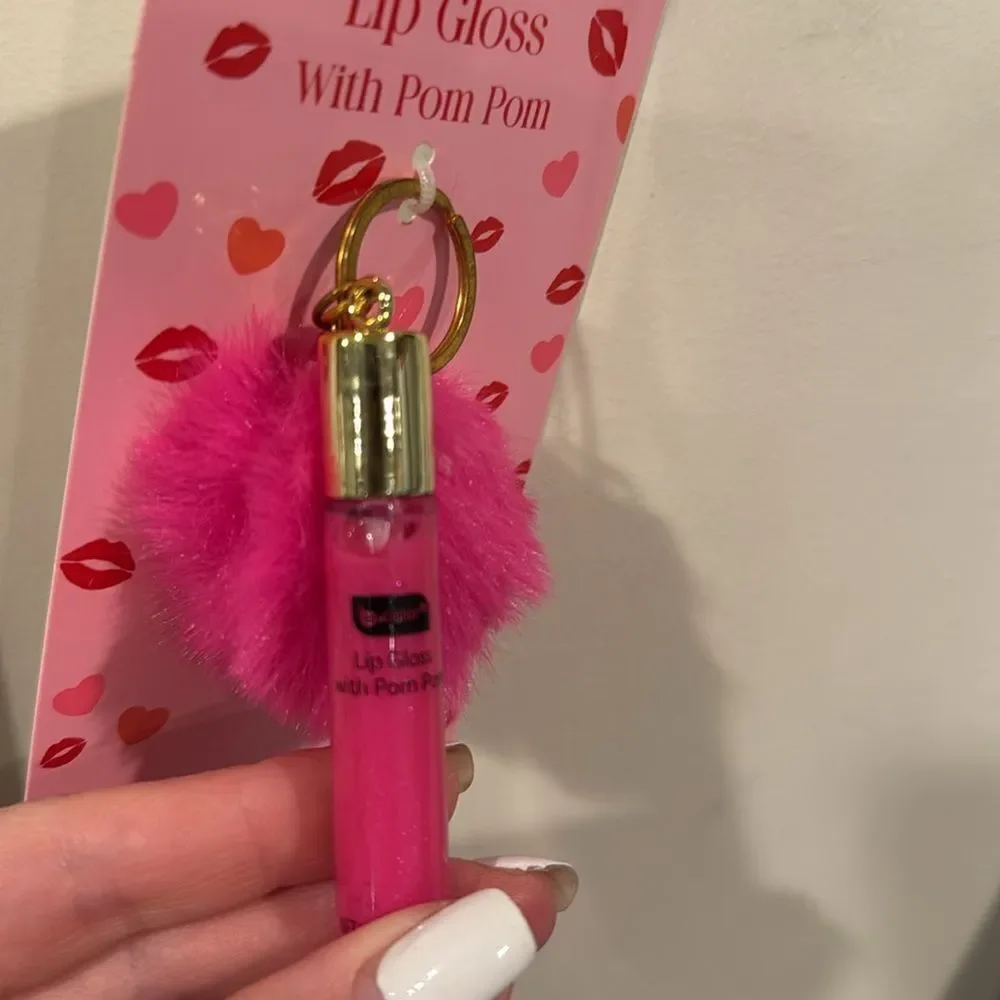 Vibrant Pink Lip Gloss with Pom Pom